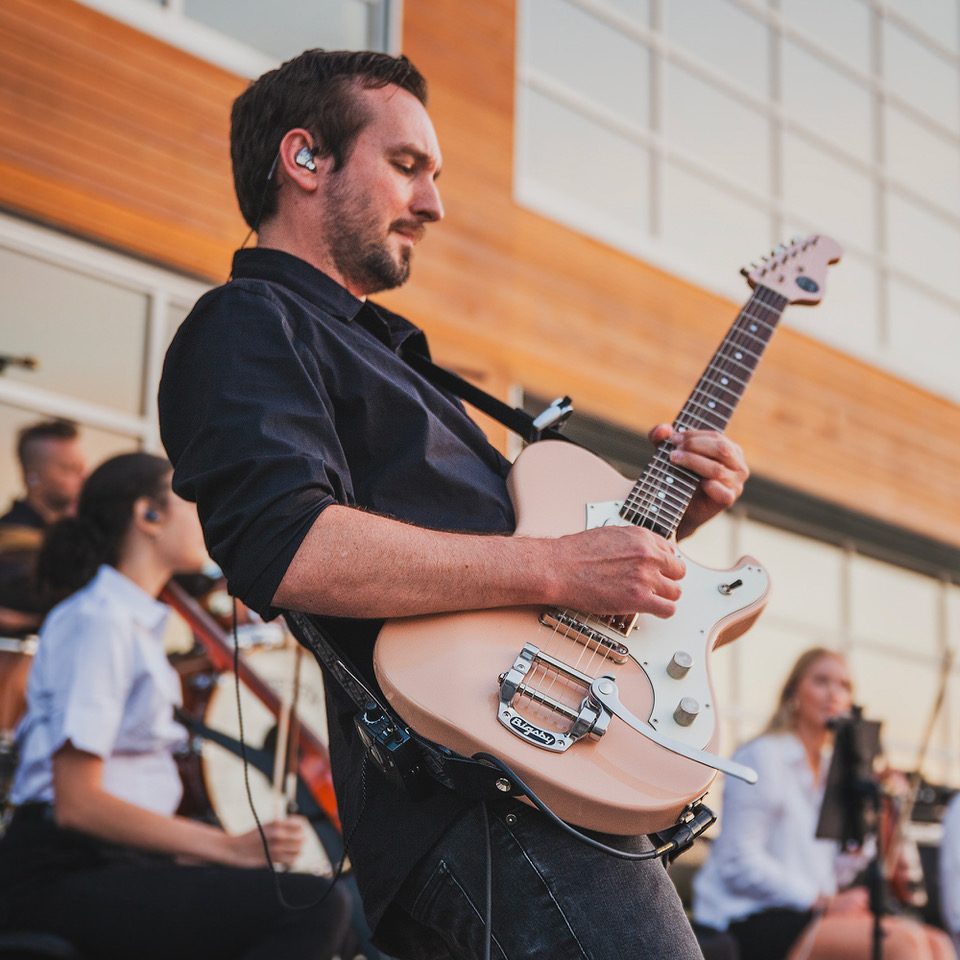 Gabriel Adams performing live on electric guitar