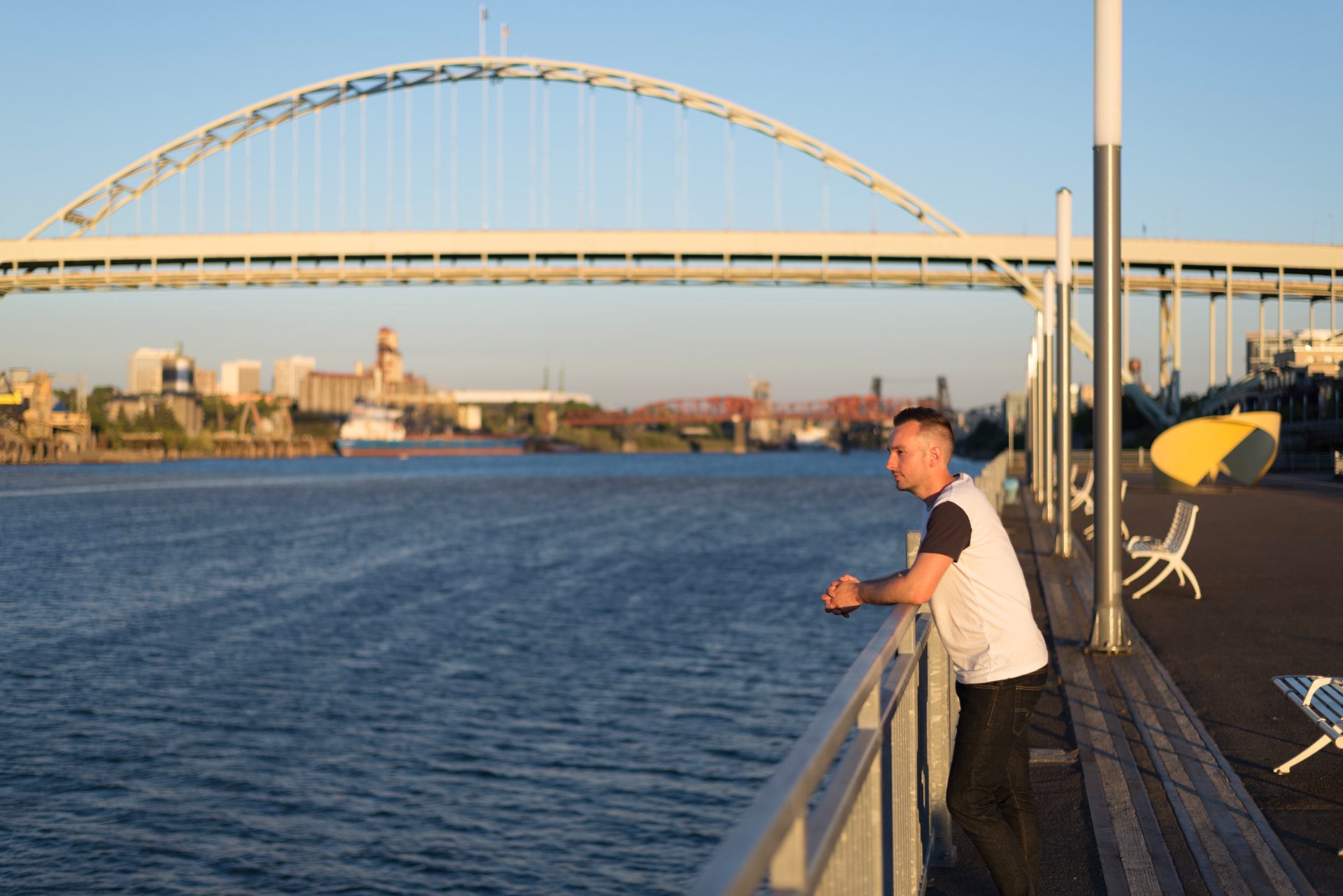 Gabriel Adams on the Portland waterfront beneath the Fremont Bridge